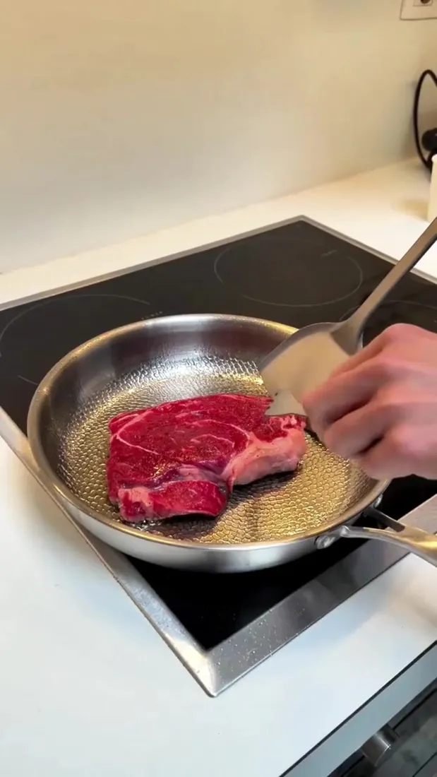 Searing steak on an induction cooktop