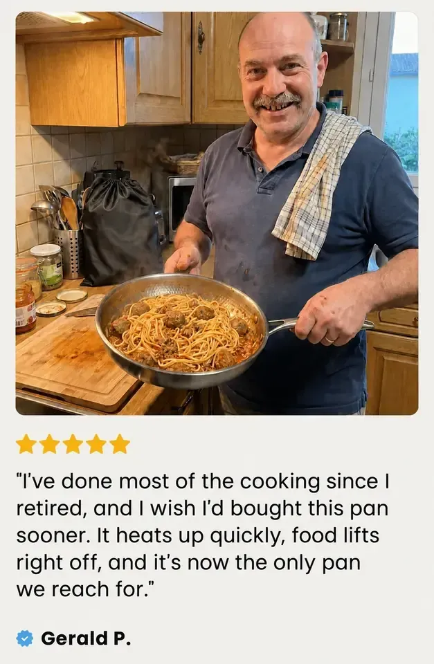Customer review from Gerald P. holding the pan with pasta