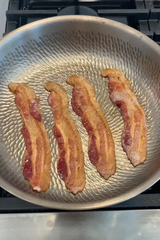 Bacon cooking in the Joyhnny pan