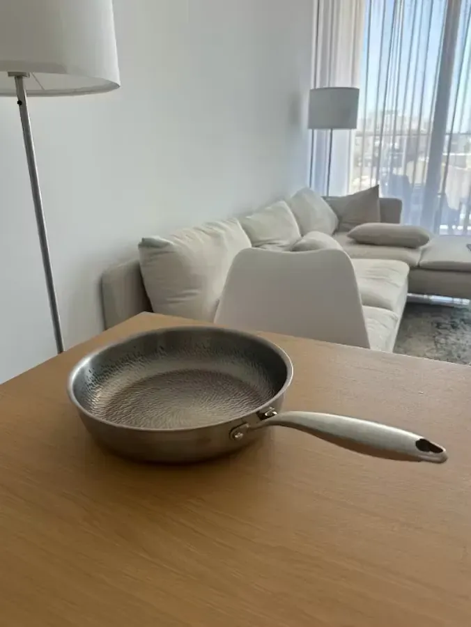 Joyhnny pan on a table at home