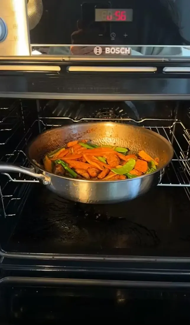 Vegetables roasting in the pan in the oven